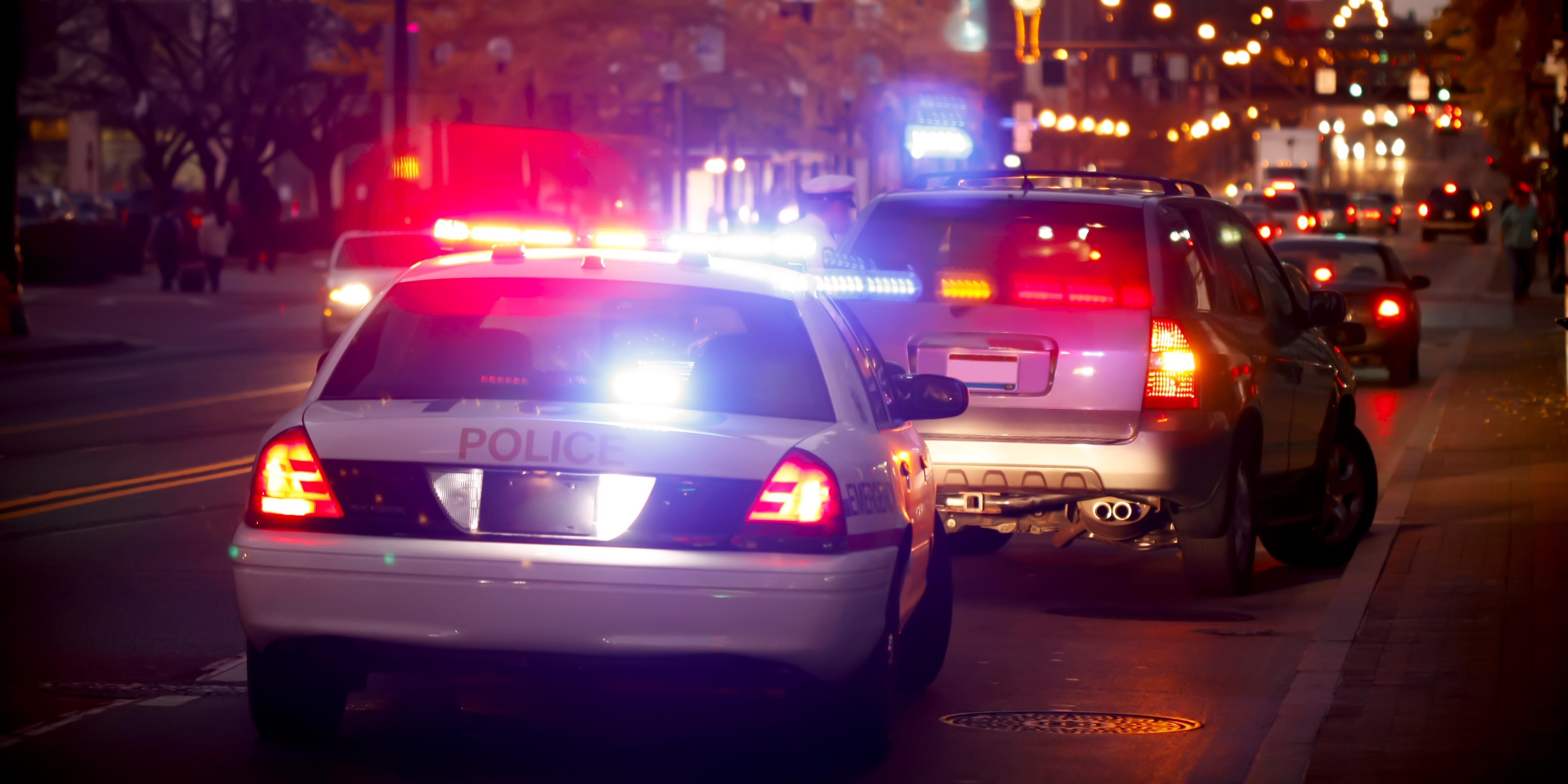 Photo: Police car stopping vehicle